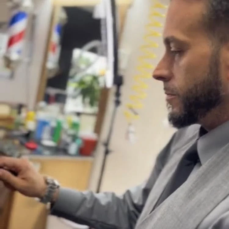 Jay in his barber studio